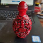 Chinese Intricately Carved Red Cinnabar Snuff Scent Bottle complete with stopper Chinese Intricately Carved Red Cinnabar Snuff Scent Bottle complete with stopper