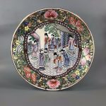 A fine Qing 19thc. Canton Famille Rose charger, painted with a courtly scene