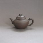A Small Chinese Yixing teapot, seal marks to lid and base.