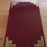 Vintage Chinese Red lacquered box, with brass mounts.