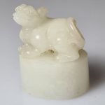 A Superb Qing Dynasty Miniature White Jade Seal Carving Depicting A Lion Dog. A Superb Qing Dynasty Miniature White Jade Seal Carving Depicting A Lion Dog.