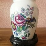 Vintage Chinese Design Peony Vase on a Chinese decorative wooden stand Vintage Chinese Design Peony Vase on a Chinese decorative wooden stand