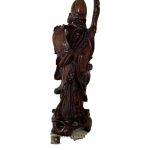 A RARE OKIMONO BOXWOOD FIGURE OF THE CHINESE DEITY SHOU LAO WITH CRANE SCROLL A RARE OKIMONO BOXWOOD FIGURE OF THE CHINESE DEITY SHOU LAO WITH CRANE SCROLL