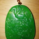 Oriental Faux Jade Pendant Decorated in Relief 5 cms High Oriental Faux Jade Pendant Decorated in Relief 5 cms High