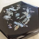 Vintage Chinese large hexagonal black lacquered lidded box with inlaid m of p. Vintage Chinese large hexagonal black lacquered lidded box with inlaid m of p.