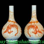 A pair of 9 inch Qianlong printed red porcelain palace phoenix vases A pair of 9 inch Qianlong printed red porcelain palace phoenix vases